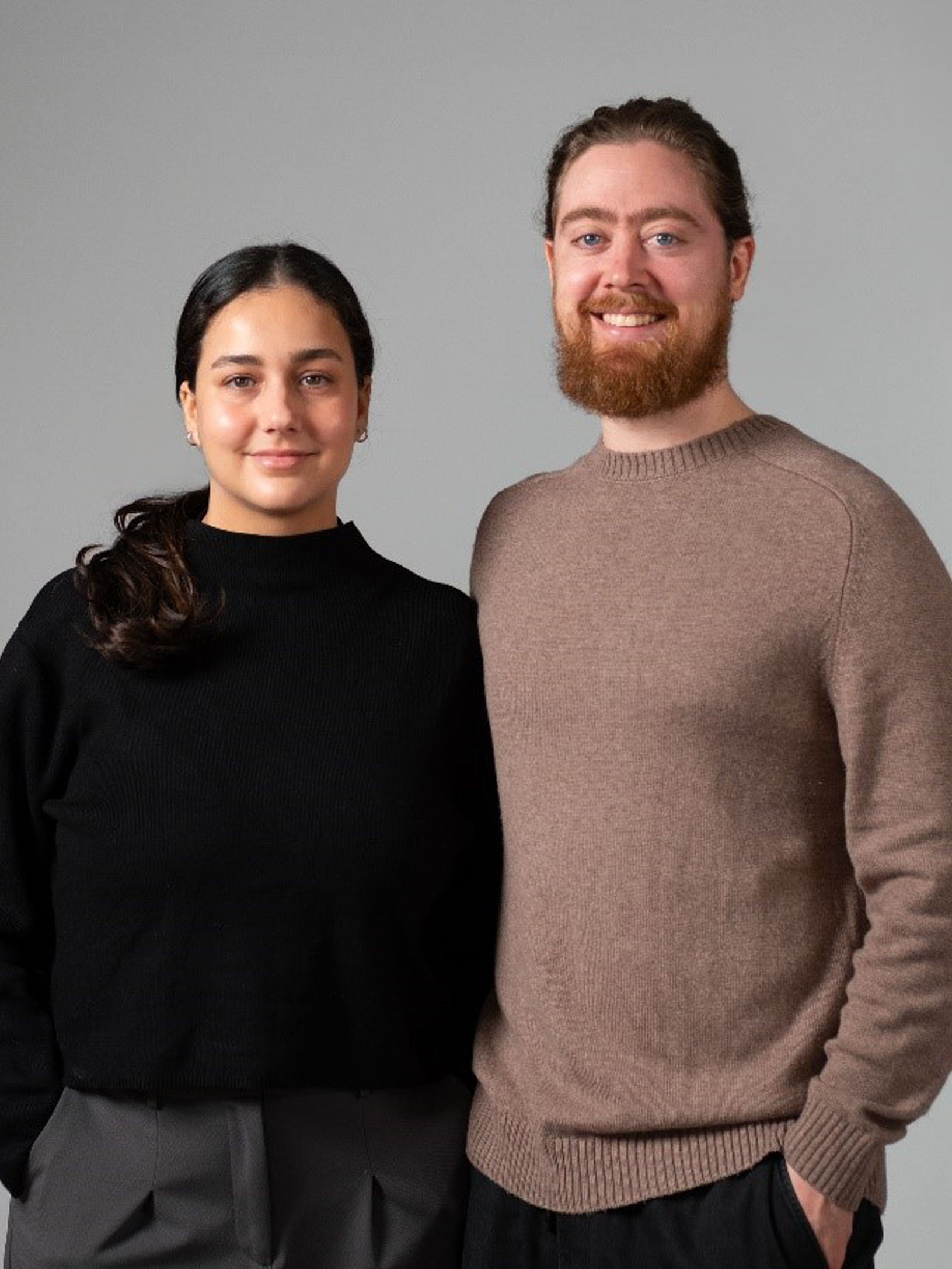 Kiima co-founders Jenny Essiambre and Samuel Lemire-Dupont stand side by side in a professional portrait.